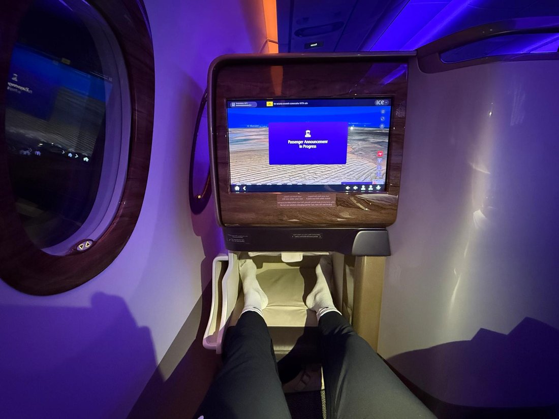 Business Class cabin — Adelaide → Dubai